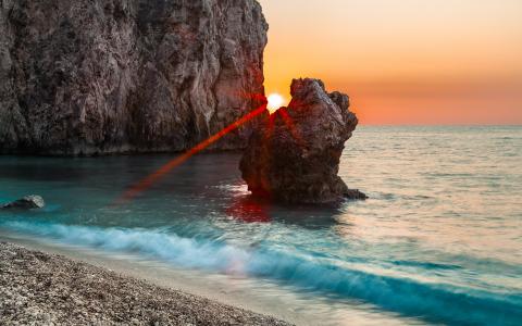 日落，岩石，海