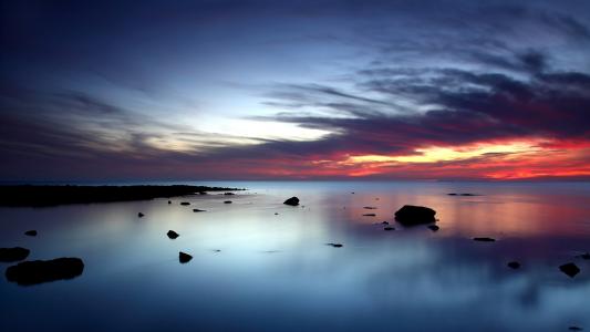 日落，海洋，石头