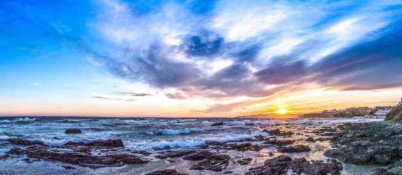 蓝色海岸夕阳图片